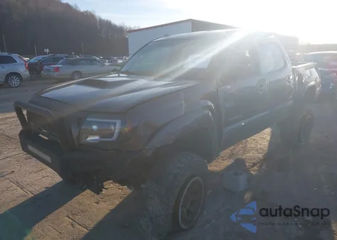2011 Toyota Tacoma Base V6 z USA, uszkodzony, nr VIN 3TMLU4EN9BM061294